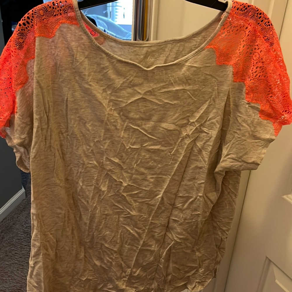 Lane Bryant. A size 14/16. A short sleeve shirt